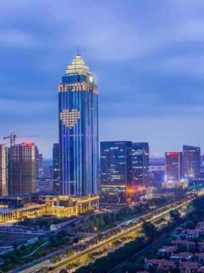 Grand New Century Hotel Haining Zhejiang Экстерьер фото